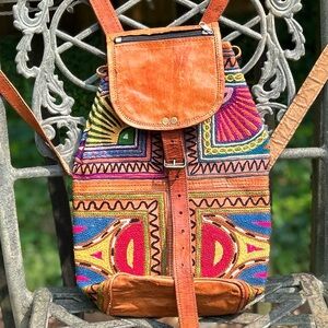 Leather and embroidered backpack